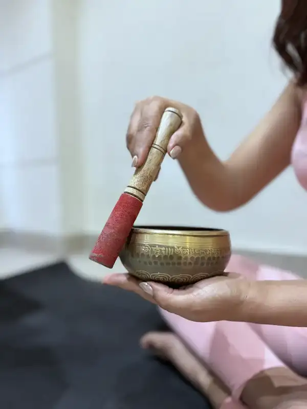 Singing bowl played during meditation